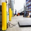 Protection Bollards installed at warehouse dock doors in active use