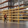 Computer made anti topple barrier shown with a person for scale