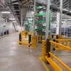 Polymer pedestrian barrier installed at HelloFresh Derby to separate personnel from conveyor systems and machinery.