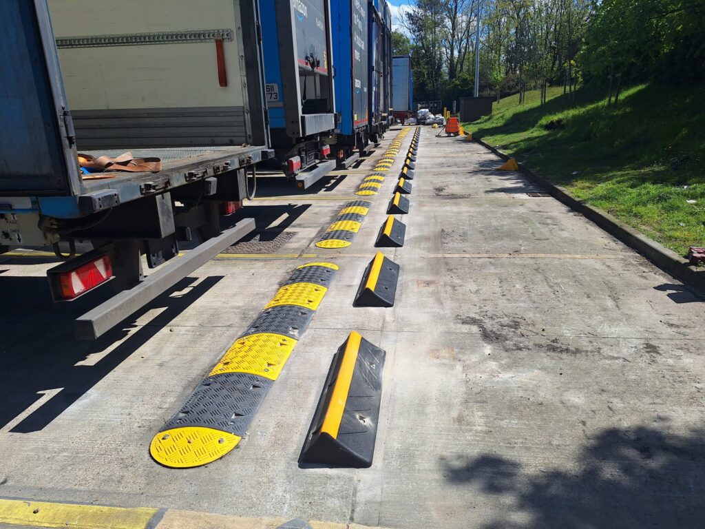 Brandsafe speed bumps and wheel stops installation at an Amazon site