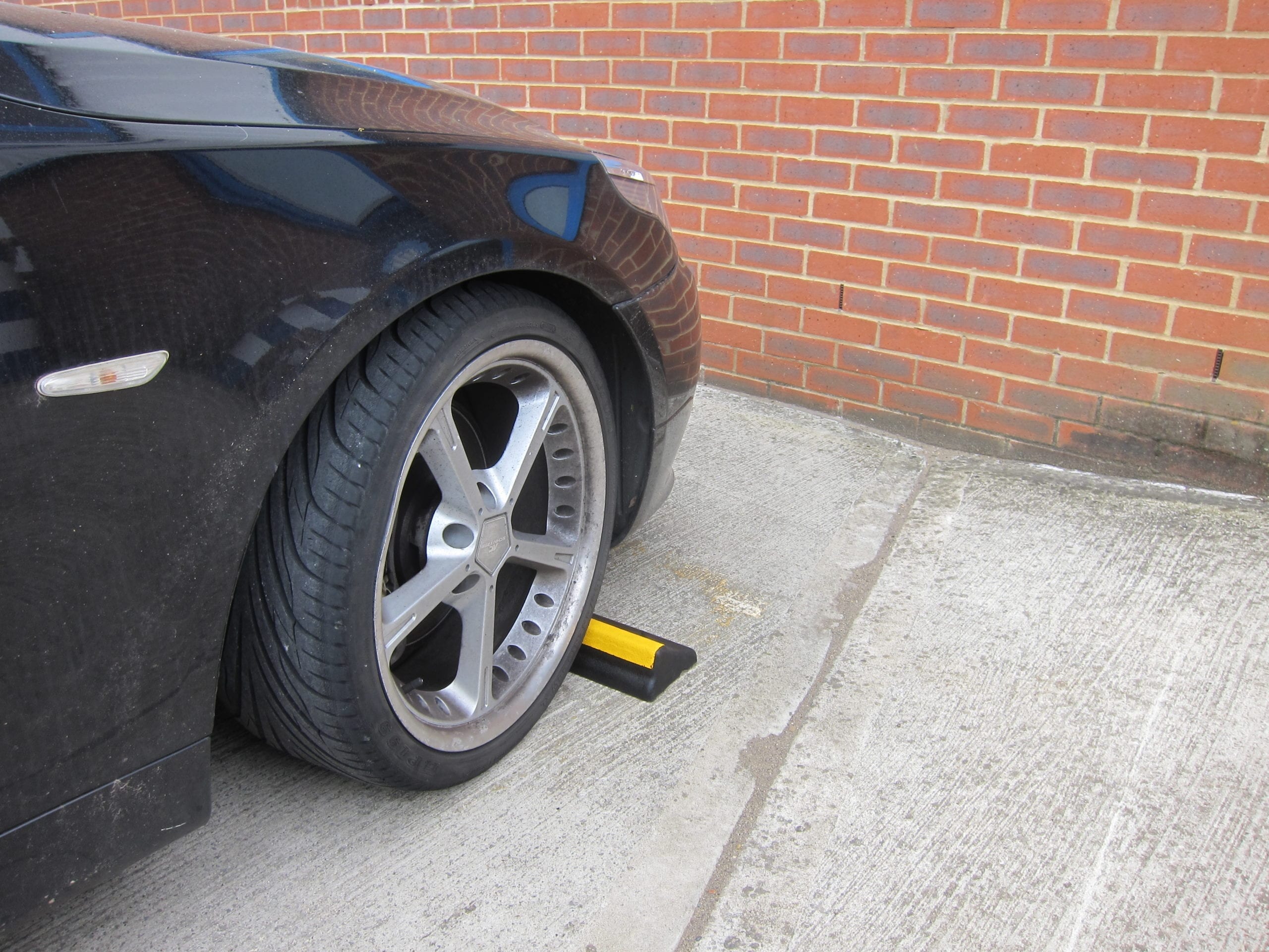 CAR Wheelstop scaled 1.jpg